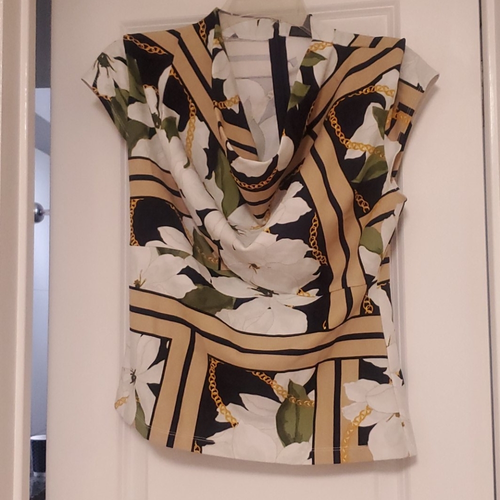 Floral with chains peplum style top M